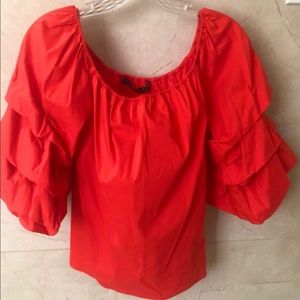 Beautiful red blouse with amazing sleeves